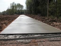 Фото заливки основания дороги бетоном М350